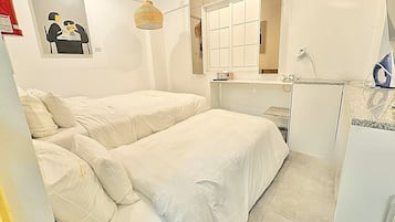 Signature Triple Room | Individually decorated, individually furnished, desk, laptop workspace