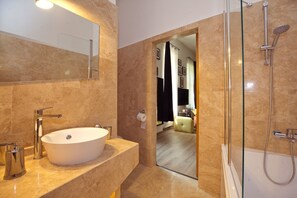 Combined shower/bathtub, hair dryer, towels, soap - Perfect Choice for Couples- The Stoned Loft- In the Heart of Budapest  (Budapest)