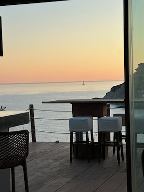 Outdoor dining - The perfect hideaway in the Greek blue Aegean seas (Syros Cyclades)