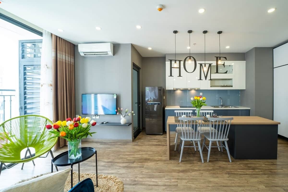 Premium Suite, 2 Bedrooms, 2 Bathrooms | Living area | 68-inch Smart TV with cable channels, TV, pay movies