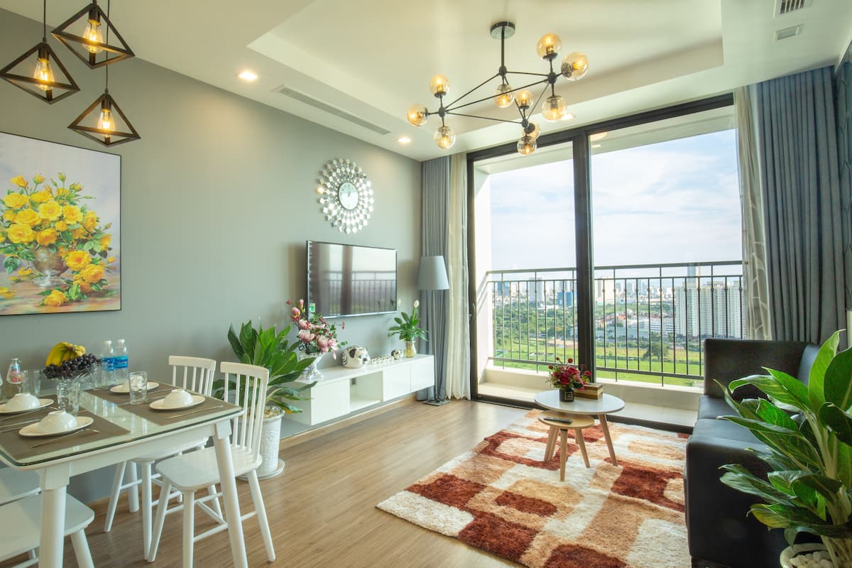 Premium Suite, 2 Bedrooms | Living area | 68-inch Smart TV with cable channels, TV, pay movies