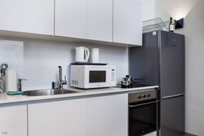 Penthouse de diseñador | Cocina privada | Refrigerador con congelador, microondas, horno y parrilla de estufa 