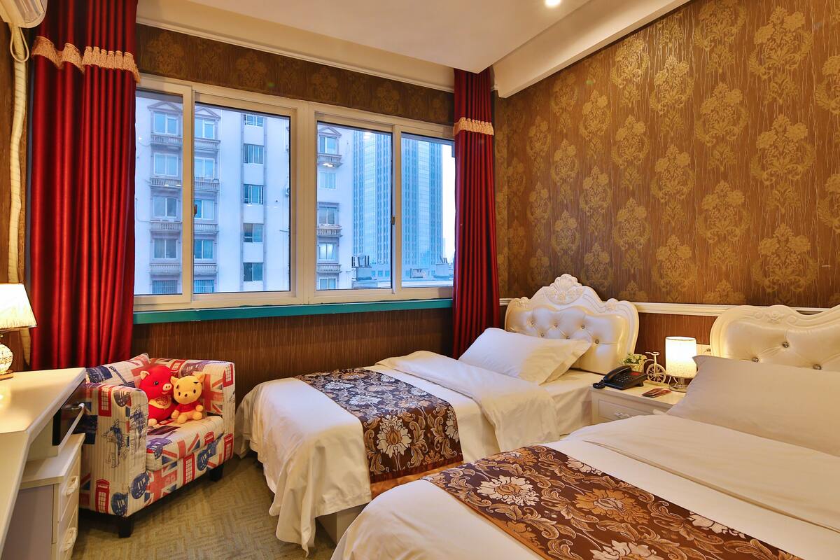 Family Room | Premium bedding, down duvets, Tempur-Pedic beds, desk