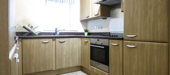 Tudors eSuites Park Central Townhouse Garden and Parking