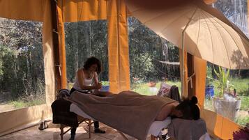 Guests can enjoy soothing massages in a serene garden setting.