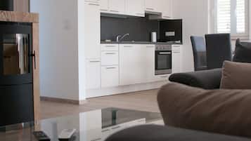Deluxe appartement | Woonruimte | Flatscreentelevisie