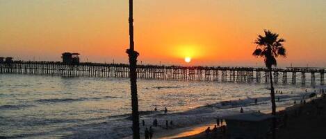 On the beach, sun-loungers, beach towels