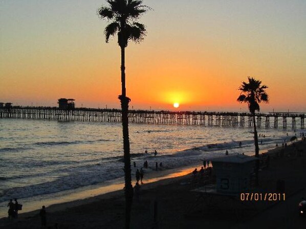 On the beach, sun-loungers, beach towels