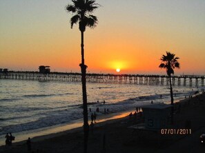 On the beach, sun-loungers, beach towels