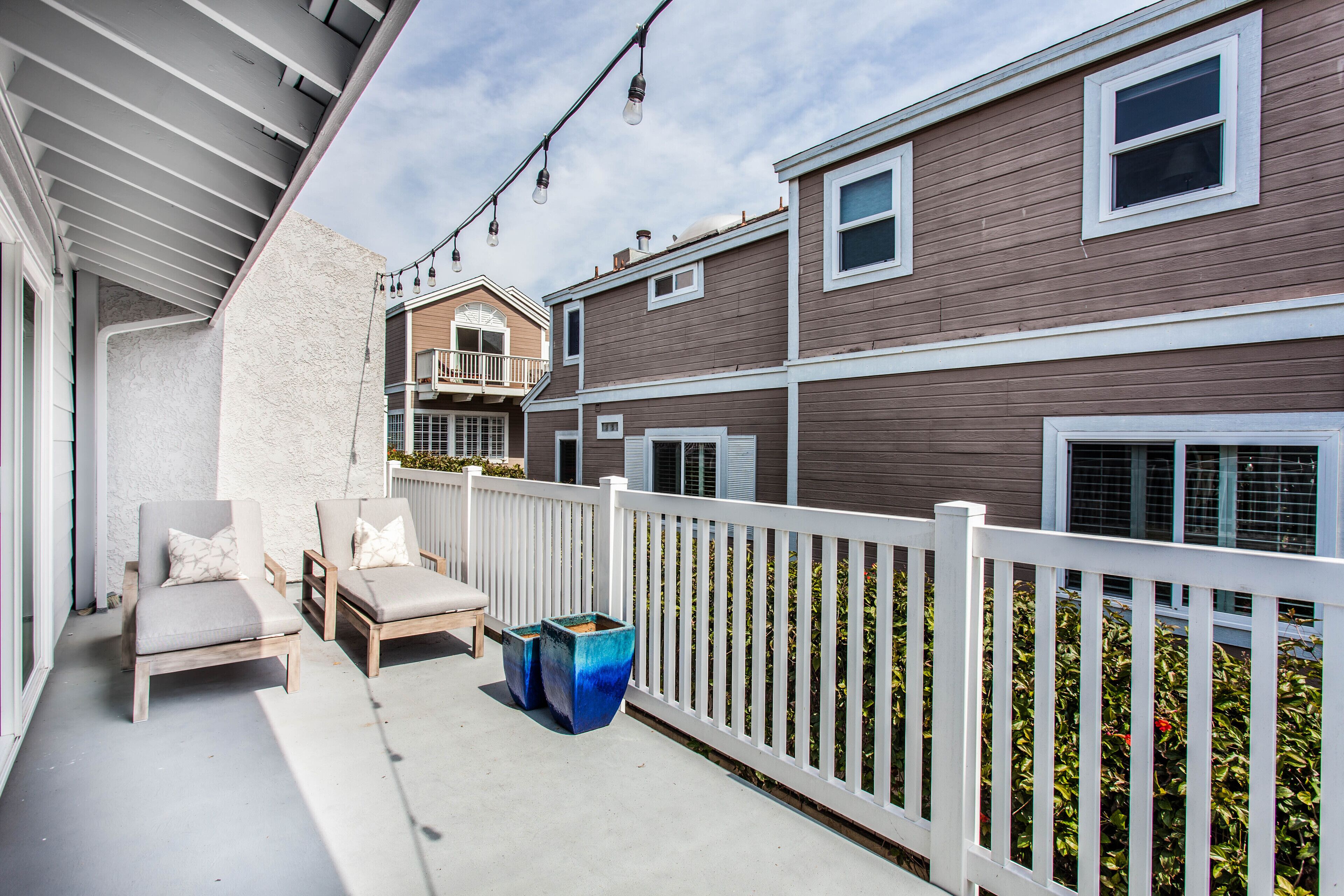 Deck off living area with 2 Chaise Lounges