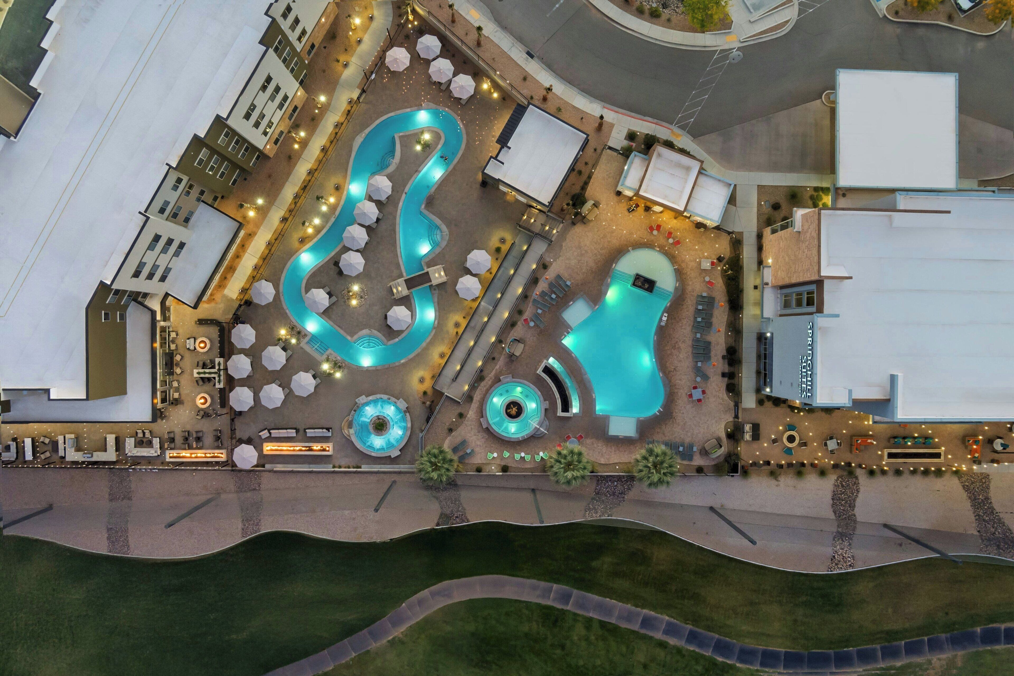 Outdoor pool, open 6:00 AM to 11:00 PM, free cabanas, pool umbrellas