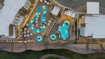 Outdoor pool, open 6:00 AM to 11:00 PM, free cabanas, pool umbrellas