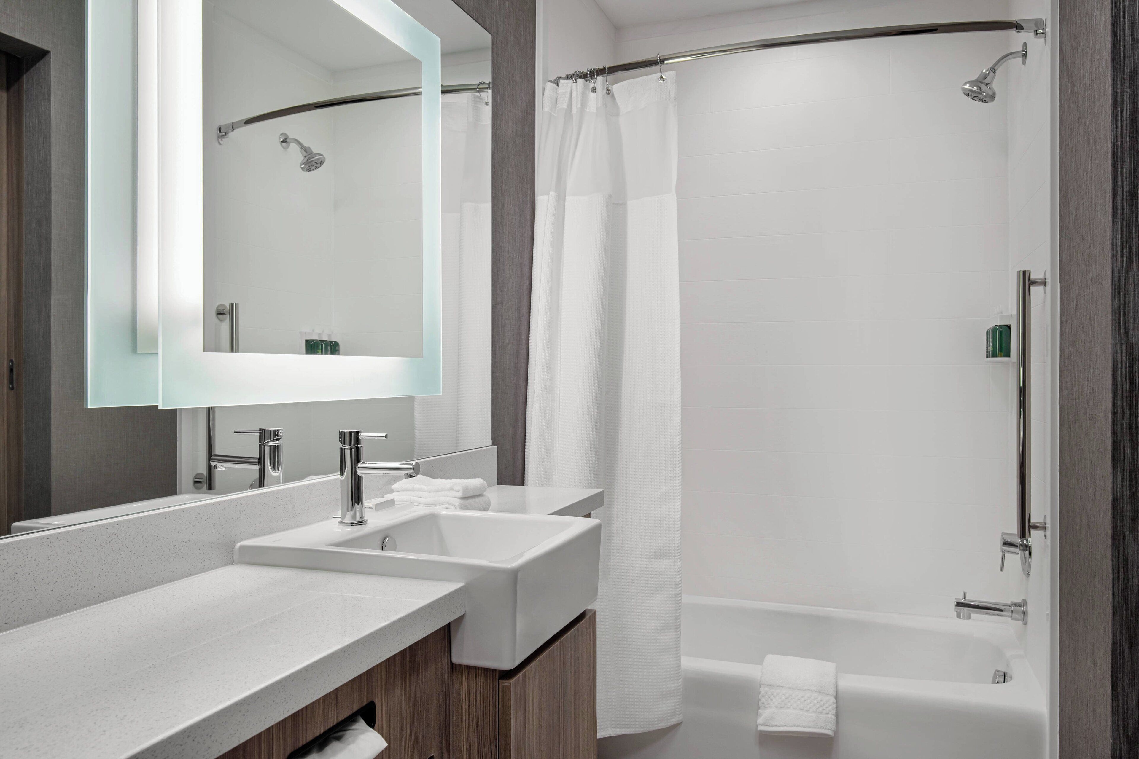 combined shower/bathtub, free toiletries, hair dryer, towels