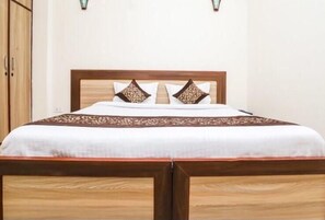 Individually furnished, desk, laptop workspace, rollaway beds