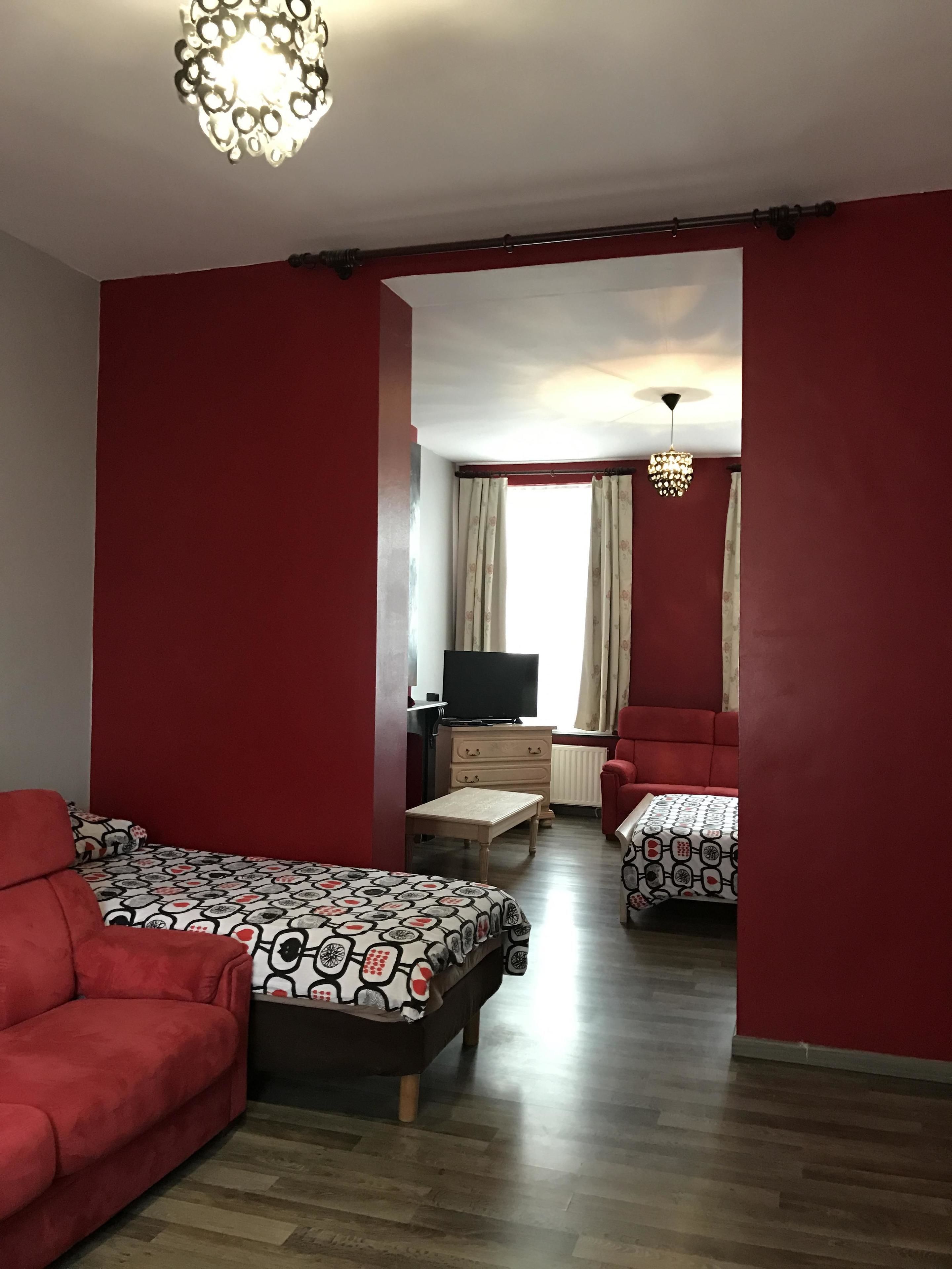 Family Double or Twin Room (Lisa) | Living area | Flat-screen TV, DVD player