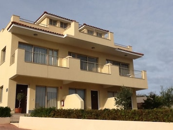 Apartment block, apart is the 2 top floors on right