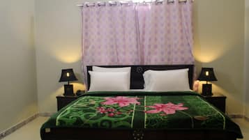 1 chambre, coffres-forts dans les chambres, fer et planche à repasser