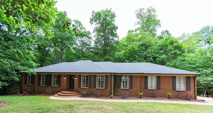 Colonial Brick Home Nestled in the Woods.