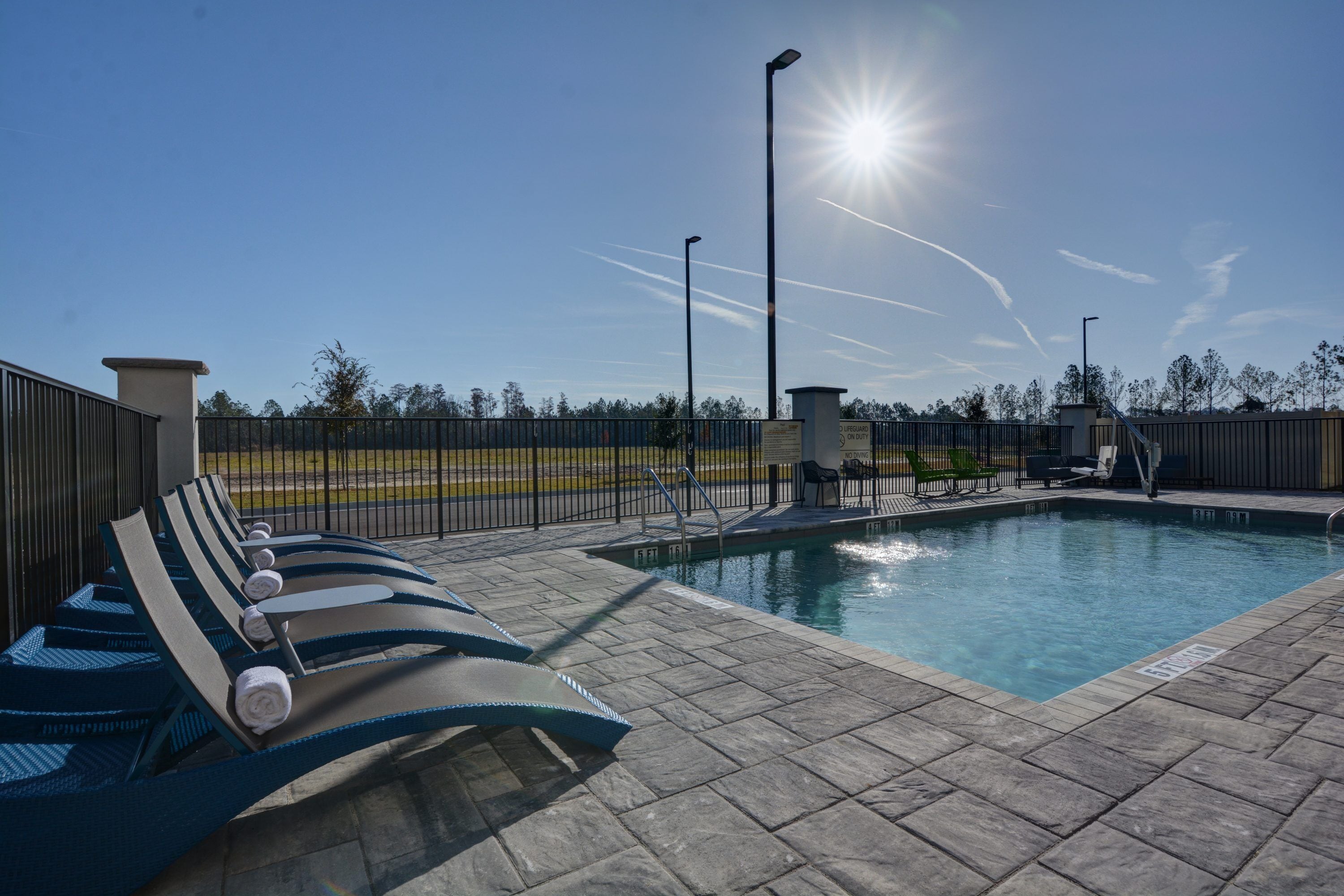 outdoor pool, pool loungers