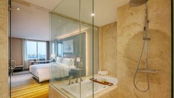 Deluxe Suite, 1 King Bed | Bathroom | Free toiletries, hair dryer, bathrobes, slippers