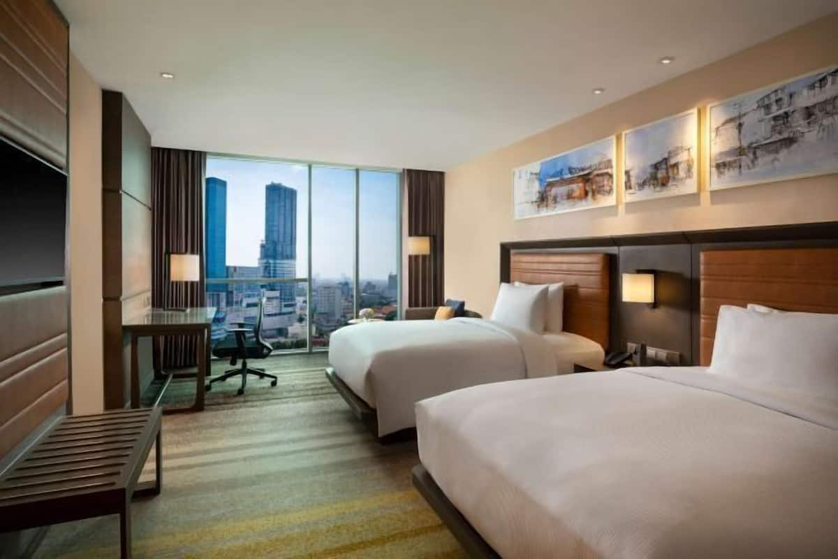 Select Comfort beds, minibar, in-room safe, desk
