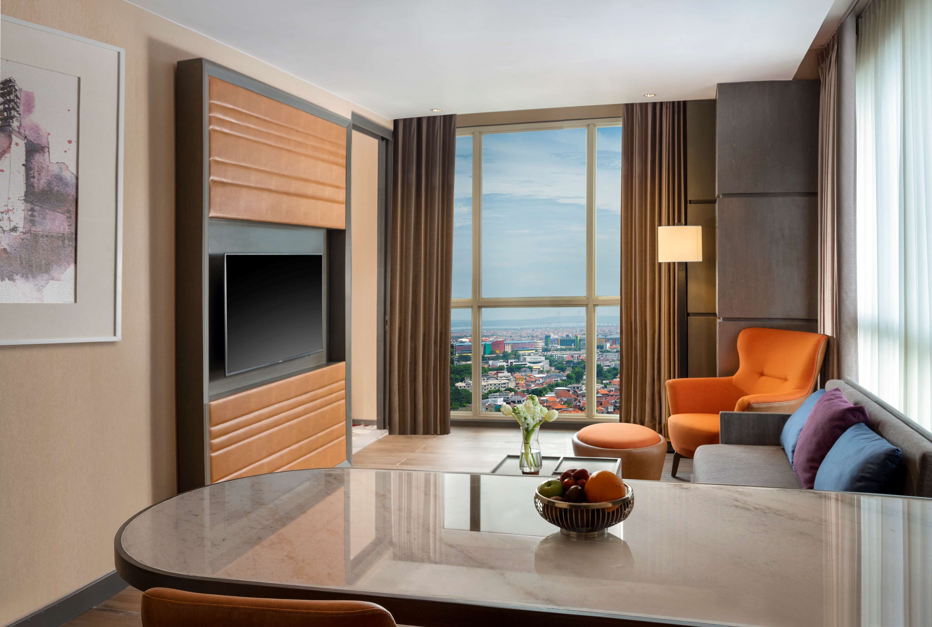 premium suite, 1 king bed | living area | 43-inch smart tv with cable channels, tv, toys