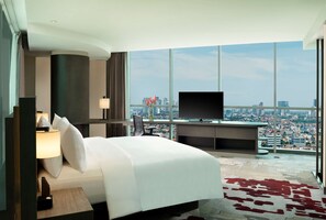 Suite exclusiva, 1 cama King size (Loft Duplex) | Camas Select Comfort, minibar y caja de seguridad en la habitación 