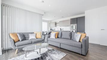 Deluxe Apartment, 2 Bedrooms | Living area | 42-inch Smart TV with digital channels, TV, Netflix