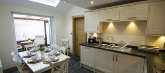 Beautiful sandstone cottage in picturesque village setting