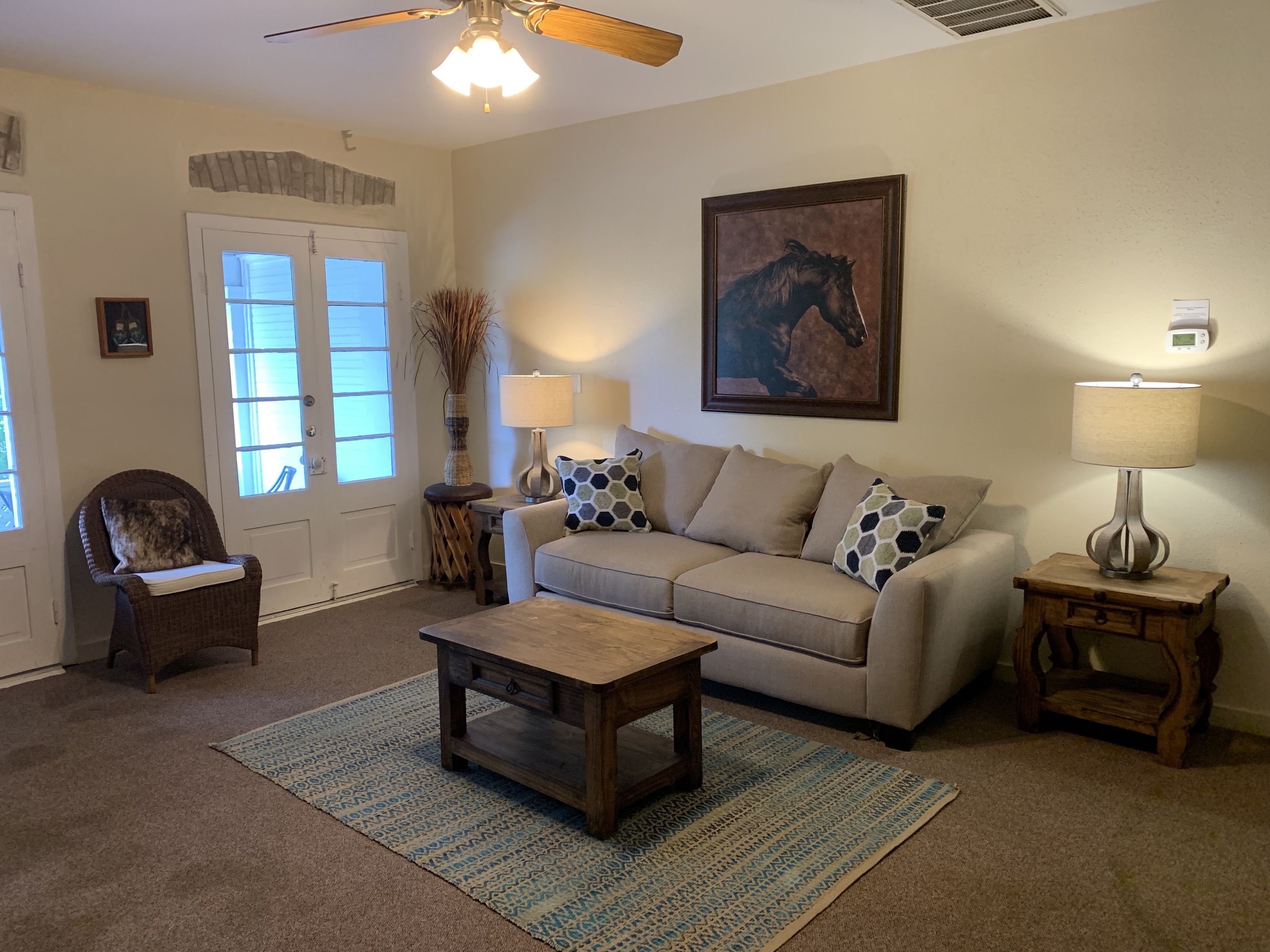 standard suite, 1 king bed with sofa bed, non smoking (comal suite) | living room | 42-inch flat-screen tv with cable channels, tv