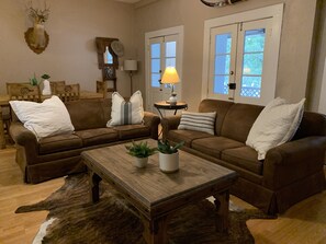 Standard Suite, Multiple Beds, Non Smoking (Lone Star Suite) | Living room | 42-inch flat-screen TV with cable channels, TV - The Schmitz Bed & Breakfast (New Braunfels)