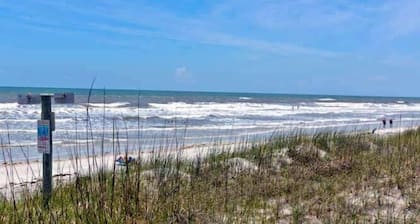STEPS TO THE BEACH AND GATED POOL! - Dog Friendly - Centrally Located