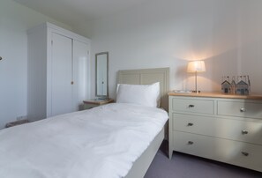 First floor: Bedroom three with a single bed