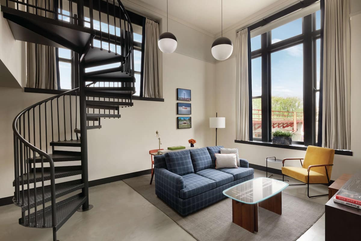 Loft, 1 King Bed | Living area | 50-inch LCD TV with digital channels, TV, music library