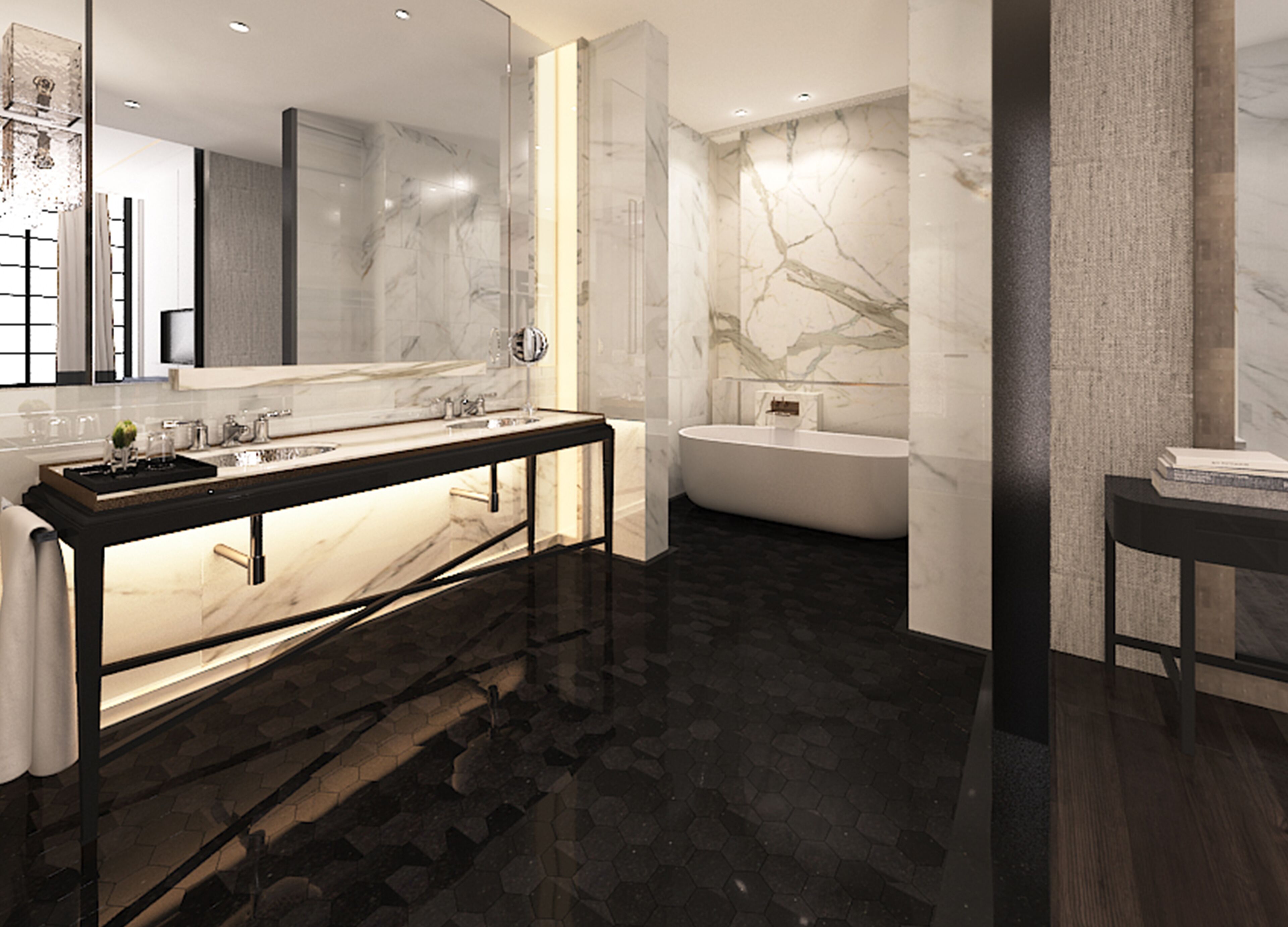 A modern bathroom with a large mirror, a vanity with a black countertop, a bathtub, and a dark floor.