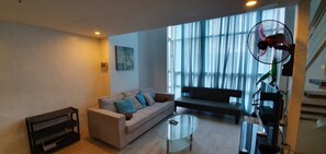 Living area - Cozy. Convenient. Complete. City/Ocean view. Travel. Stay. Enjoy. Experience. (Cebu City)