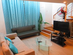Living area - Cozy. Convenient. Complete. City/Ocean view. Travel. Stay. Enjoy. Experience. (Cebu City)