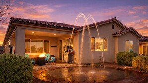 A house with a patio, outdoor seating, and a fountain. - PVZ40|Steps to Pools *SplashPad* HotTub*GreenSpace (Santa Clara)