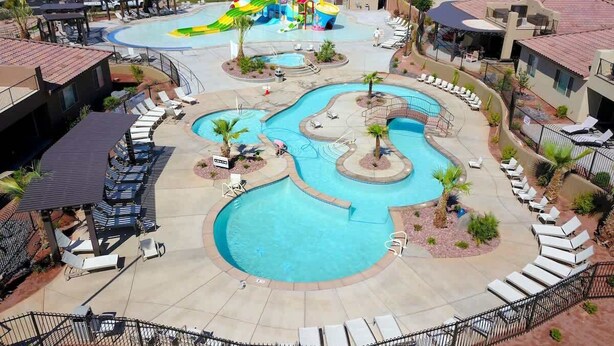A resort with multiple swimming pools, a water park, and lounge areas with sunbeds. - PVZ40|Steps to Pools *SplashPad* HotTub*GreenSpace (Santa Clara)