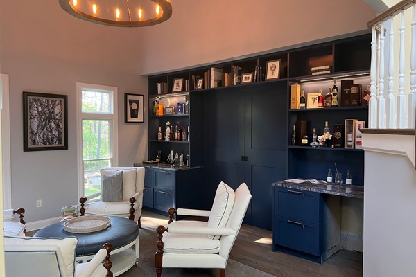 Newly renovated den with pocket doors to family room