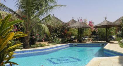 African hut comfort on estate with pool