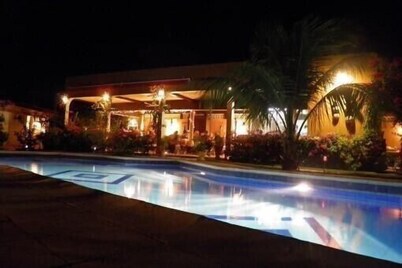 African hut comfort on estate with pool