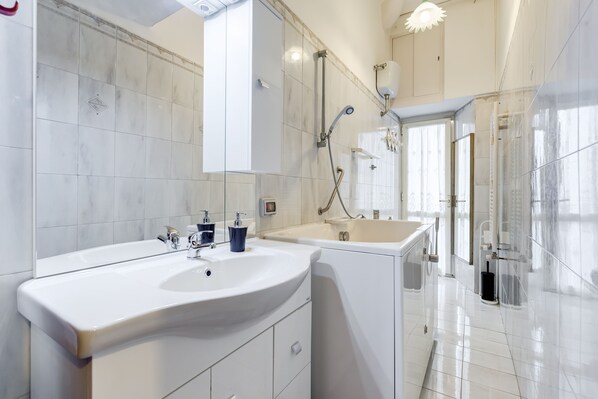 Hair dryer, towels, toilet paper