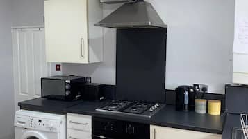 Comfort Apartment (1, next to tube station) | Private kitchen | Fridge, microwave, coffee/tea maker, electric kettle