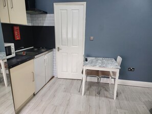 Fridge, microwave, coffee/tea maker, electric kettle