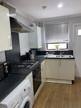 Comfort Apartment (1, next to tube station) | Private kitchen | Fridge, microwave, coffee/tea maker, electric kettle