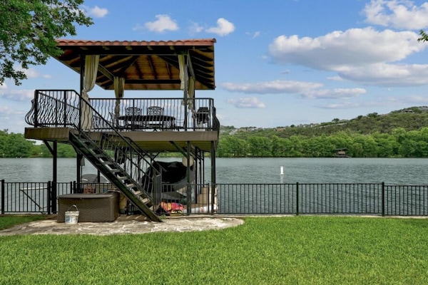Boat slip (message), full dock, and water trampoline + paddle boards and kayaks!