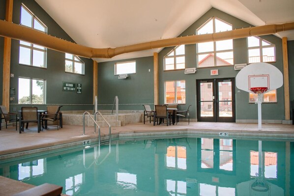Indoor pool, open 6:00 AM to 10:00 PM, pool loungers