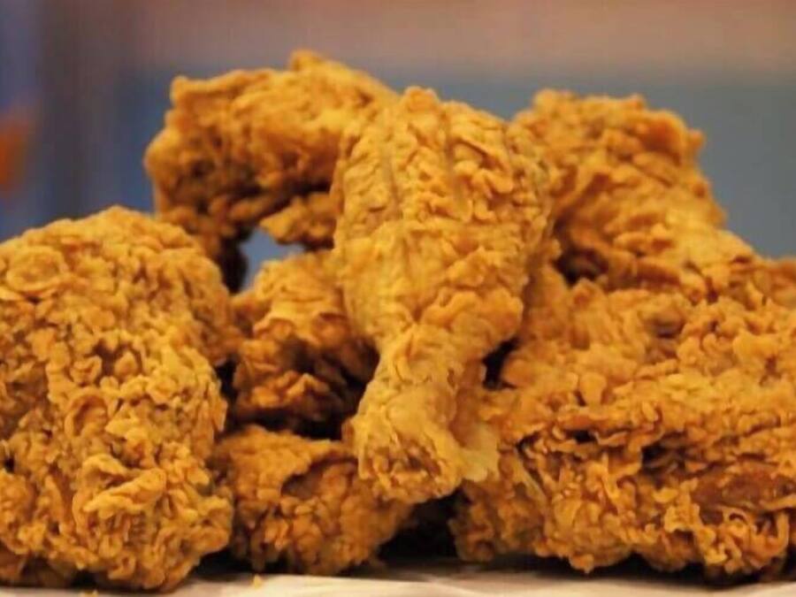 A pile of fried chicken pieces.