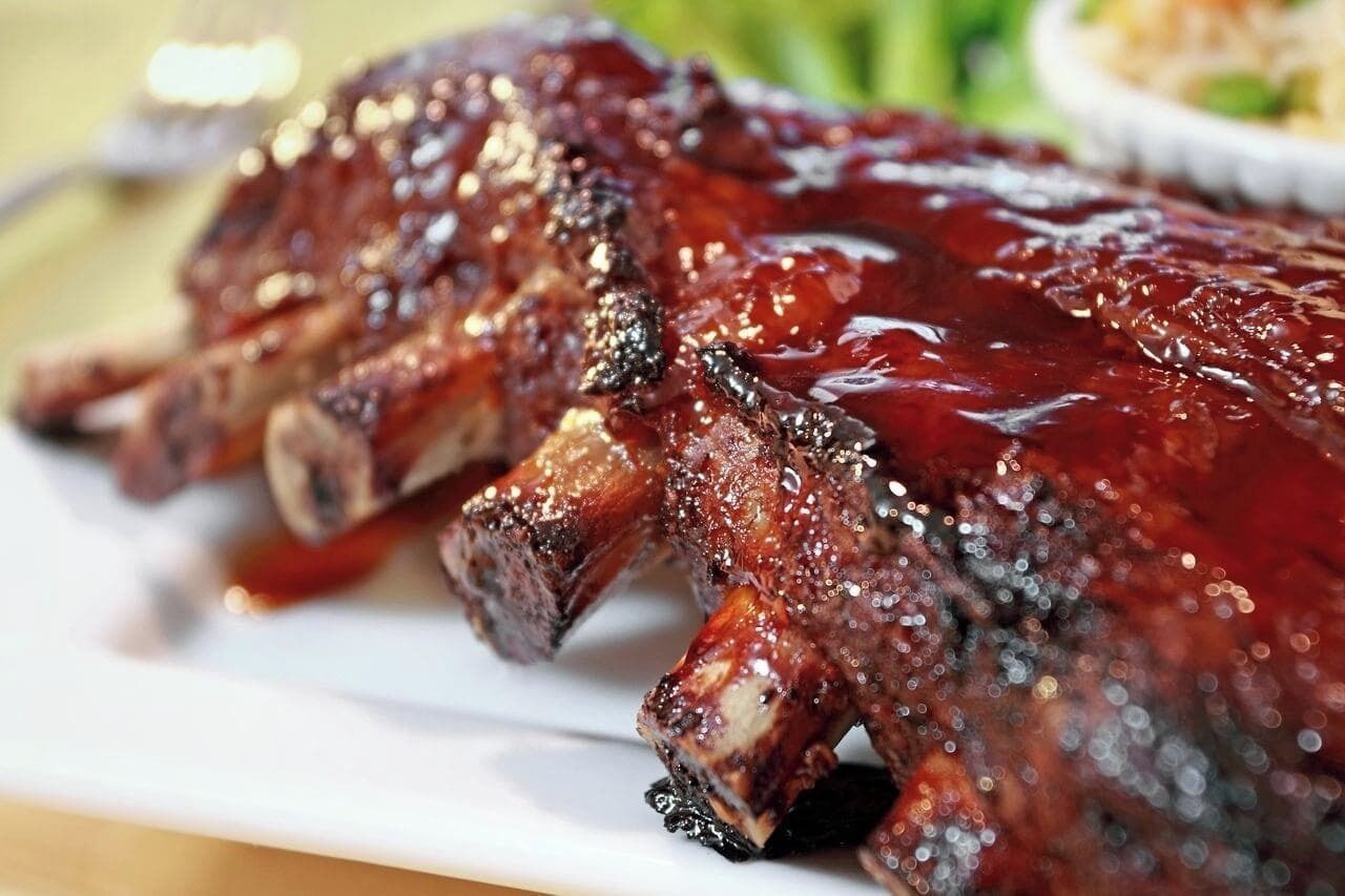 A plate of glazed ribs.